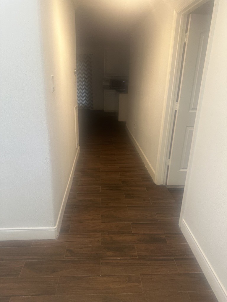 304 Jill Street Conroe, TX 77303 - Photo 14 of 35 a view of a hallway