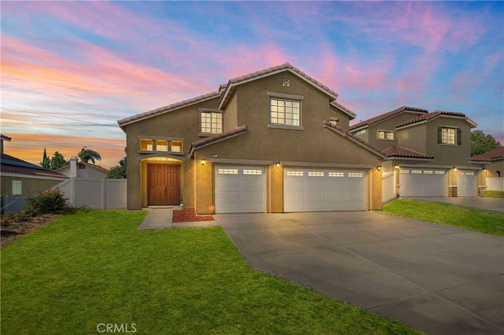 3553 Tyco Drive Riverside, CA 92501 - Photo 1 of 1 a front view of a house with a yard and garage