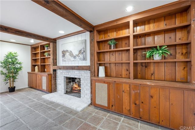 a bathroom with a sink mirror and toilet