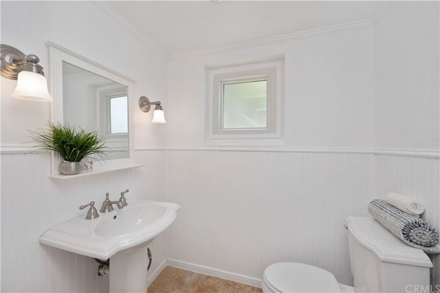 a backyard of a house with outdoor seating