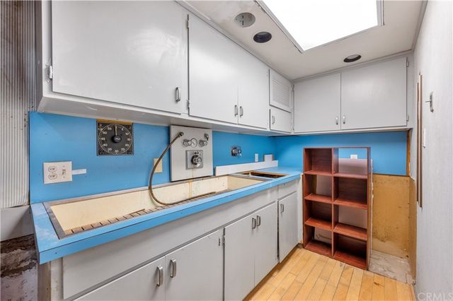 a front view of a house with a yard and a garage