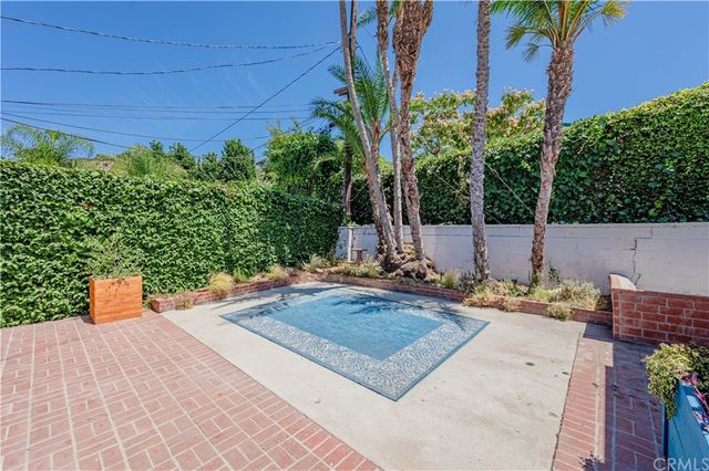 a view of a yard with an outdoor space