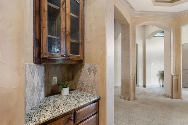 a view of a kitchen cabinets and a counter place