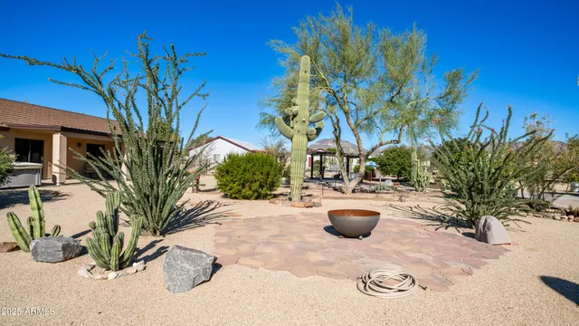a view of a backyard of the house