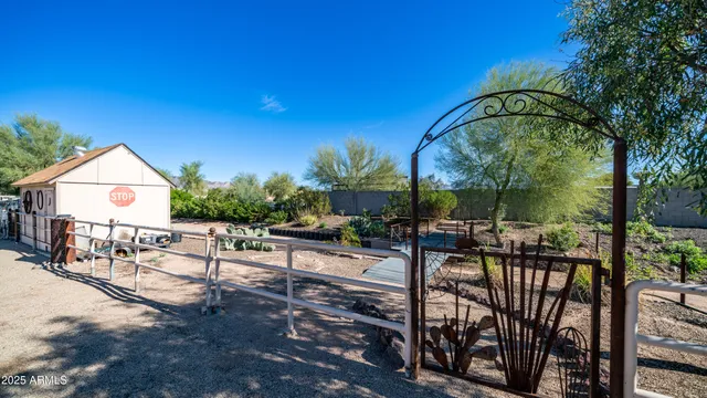 a view of a backyard with a sitting area