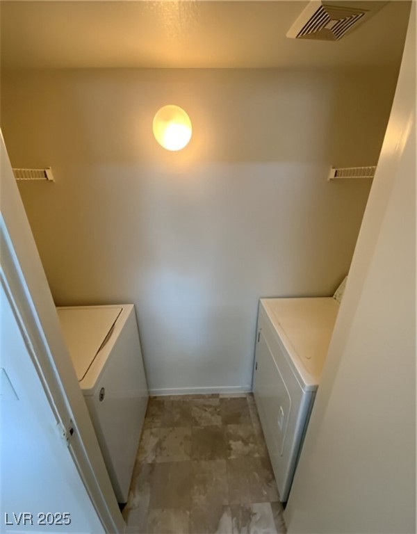 6650 West Warm Springs Road, Unit 1024 Las Vegas, NV 89118 - Photo 11 of 14 Laundry room with storage shelves