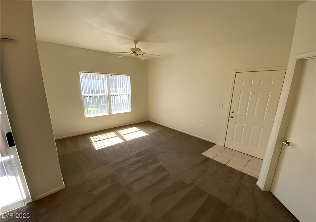 6650 West Warm Springs Road, Unit 1024 Las Vegas, NV 89118 - Photo 4 of 14 Spacious living room in front
