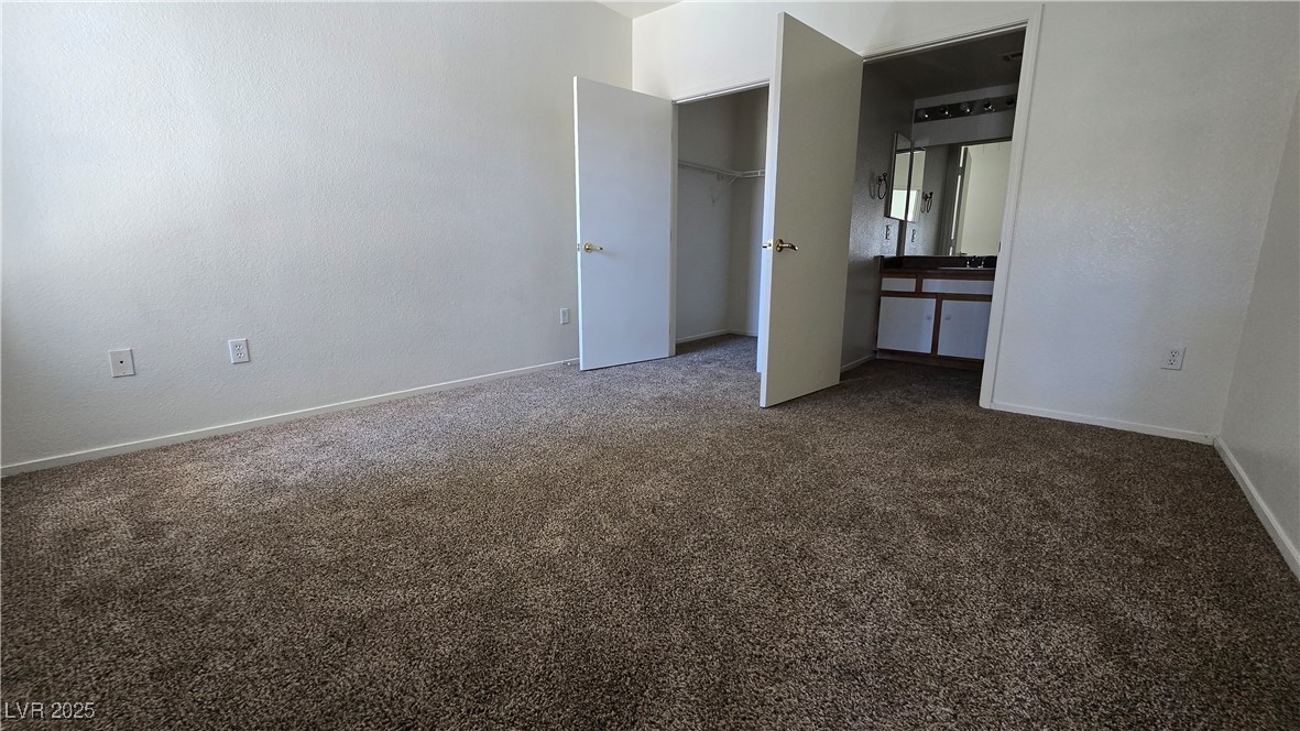 6650 West Warm Springs Road, Unit 1024 Las Vegas, NV 89118 - Photo 8 of 14 Large Primary Bedroom