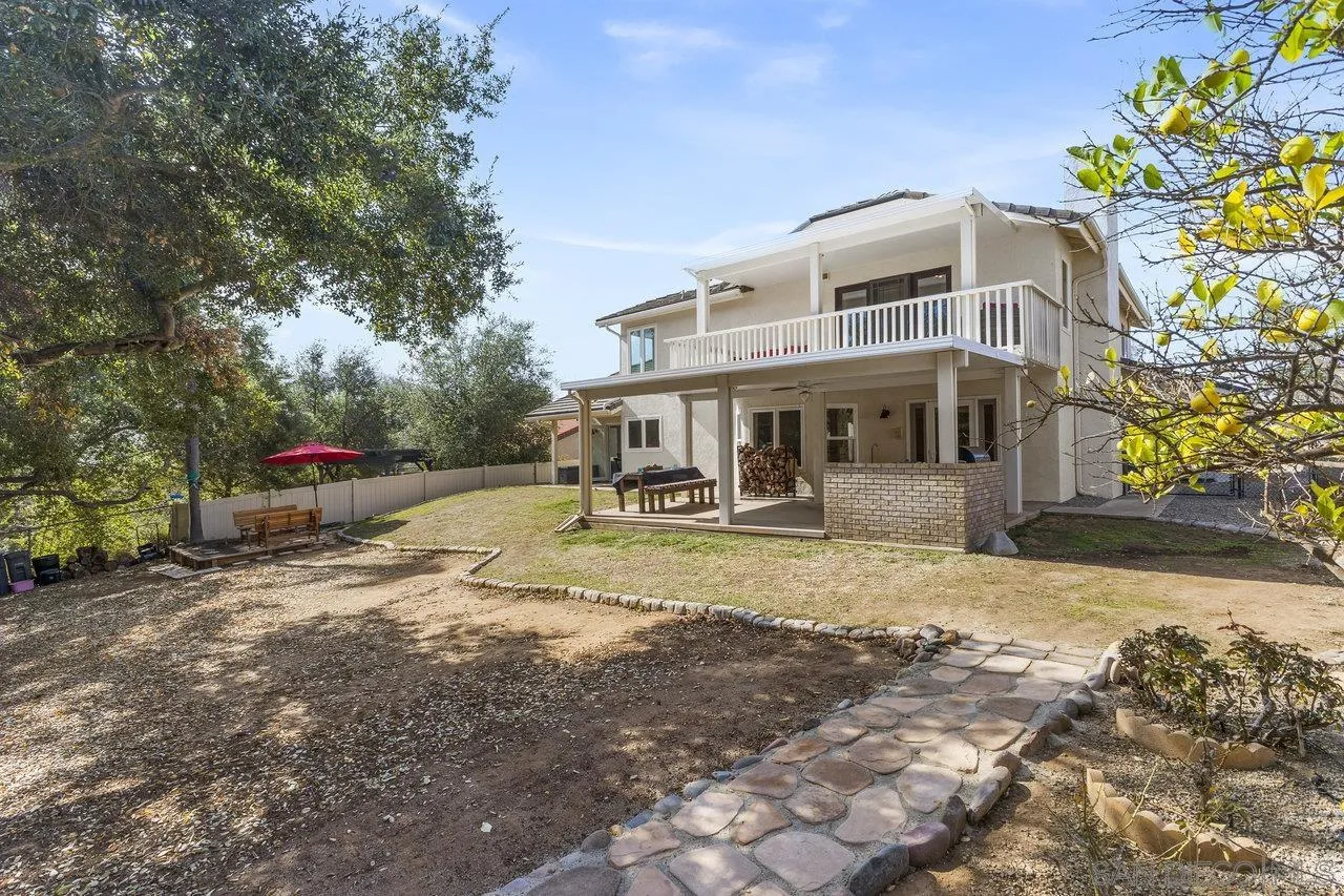 15931 Litten Way Ramona, CA 92065 - Photo 33 of 43 a view of a house with a yard
