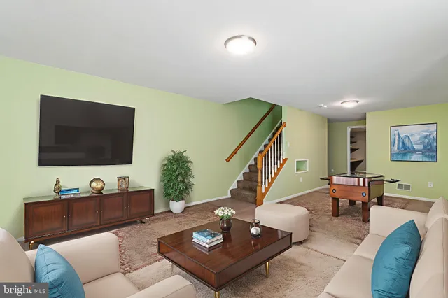 a view of a house with a yard porch and sitting area