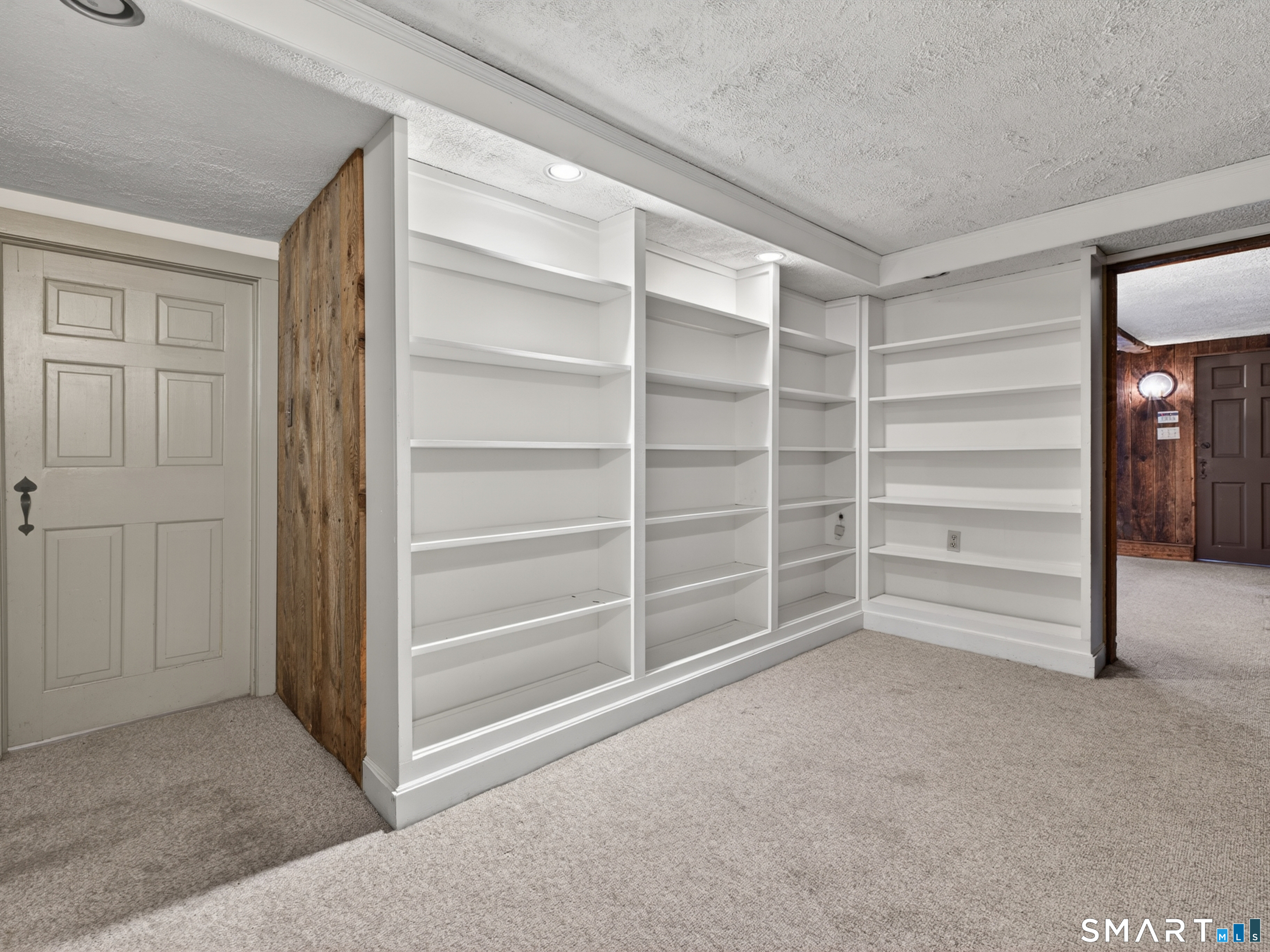 14 Cow Pen Hill Road Killingworth, CT 06419 - Photo 37 of 40 Thoughtfully designed with ample shelving and display space for your favorite books, treasured keepsakes, and cherished family mementos