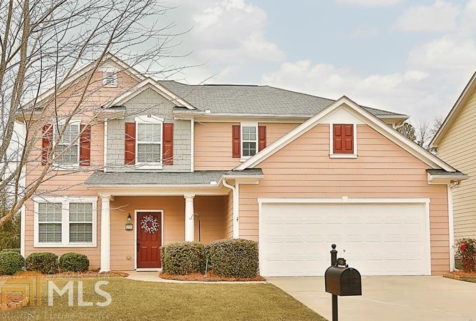 120 Maple Hill Drive Newnan, GA 30265 - Photo 1 of 1 a front view of a house with a yard