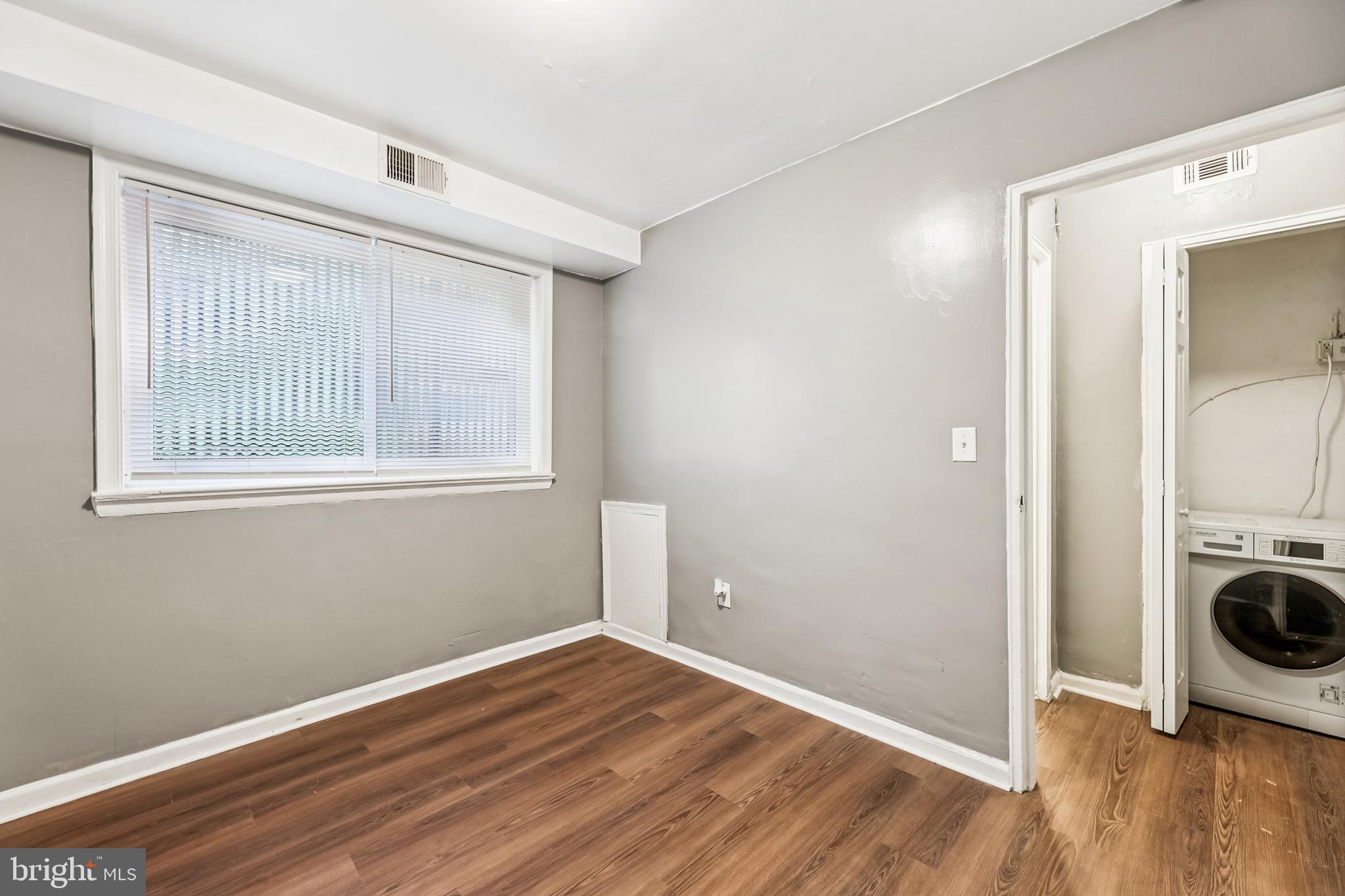 2640 Wade Road Southeast, Unit 2 Washington, DC 20020 - Photo 17 of 23 a view of a room with wooden floor and sink