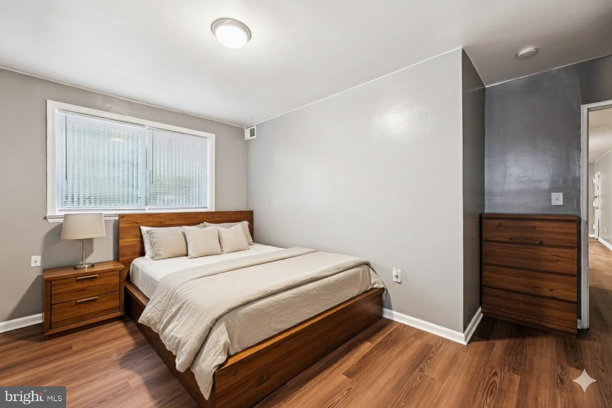 2640 Wade Road Southeast, Unit 2 Washington, DC 20020 - Photo 18 of 23 a bed room with a bed and a window