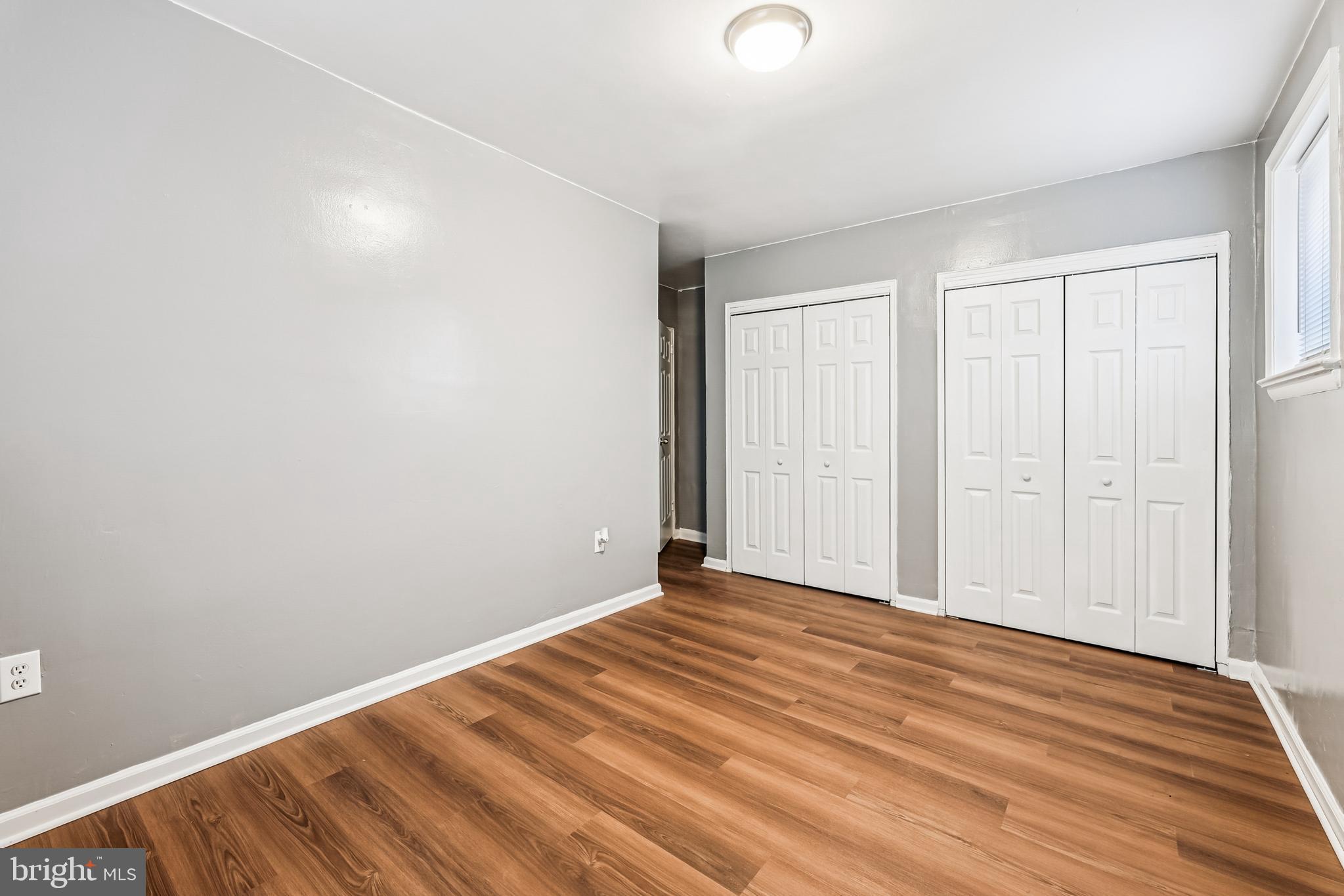 2640 Wade Road Southeast, Unit 2 Washington, DC 20020 - Photo 20 of 23 a view of an empty room with wooden floor