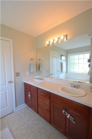 1523 Ripken Court Murfreesboro, TN 37129 - Photo 8 of 15 Master Bathroom with Double Vanities and a Private Toilet Room