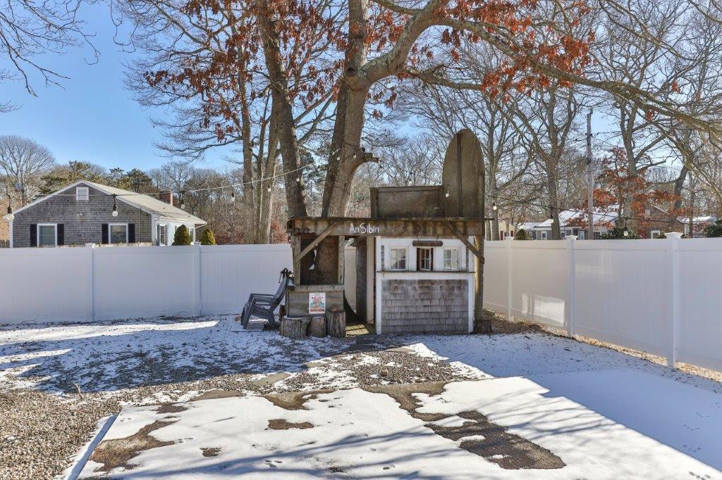 110 Kelley Road Hyannis, MA 02601 - Photo 27 of 30 a front view of a house with garden