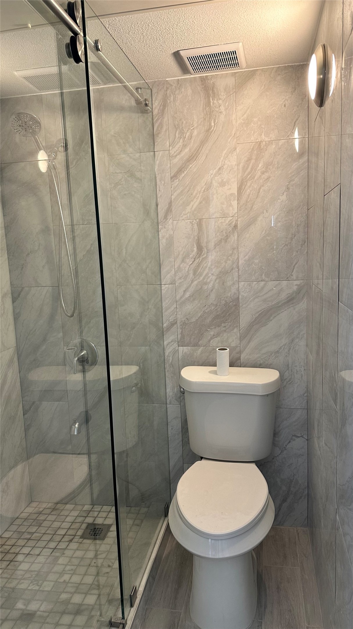 6200 Ranchester Drive, Unit 230 Houston, TX 77036 - Photo 11 of 31 a bathroom with a toilet and a shower