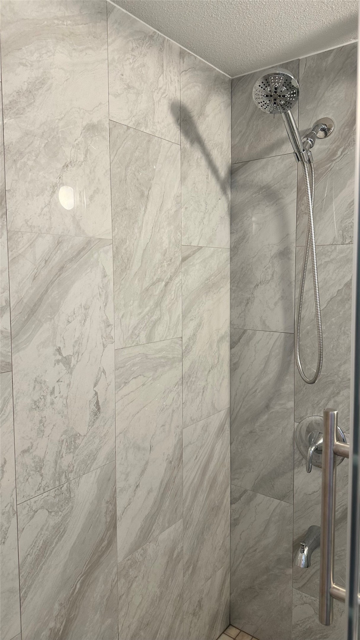 6200 Ranchester Drive, Unit 230 Houston, TX 77036 - Photo 12 of 31 a bathroom with a shower