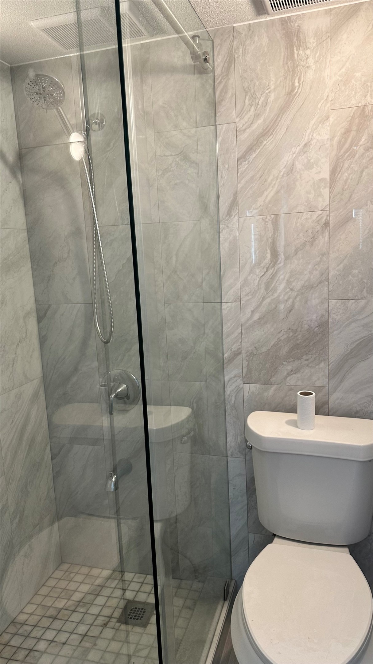 6200 Ranchester Drive, Unit 230 Houston, TX 77036 - Photo 13 of 31 a white toilet sitting next to a shower