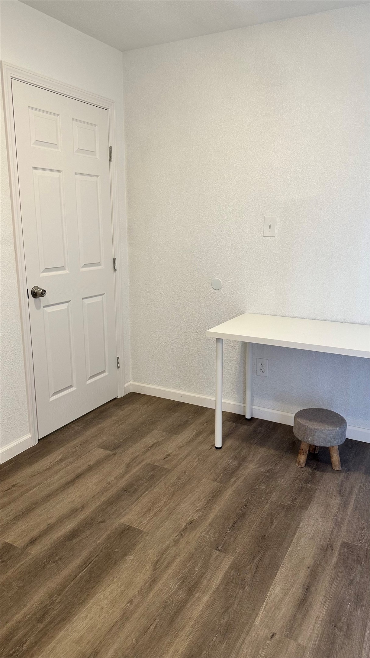 6200 Ranchester Drive, Unit 230 Houston, TX 77036 - Photo 15 of 31 a view of an empty room and wooden floor