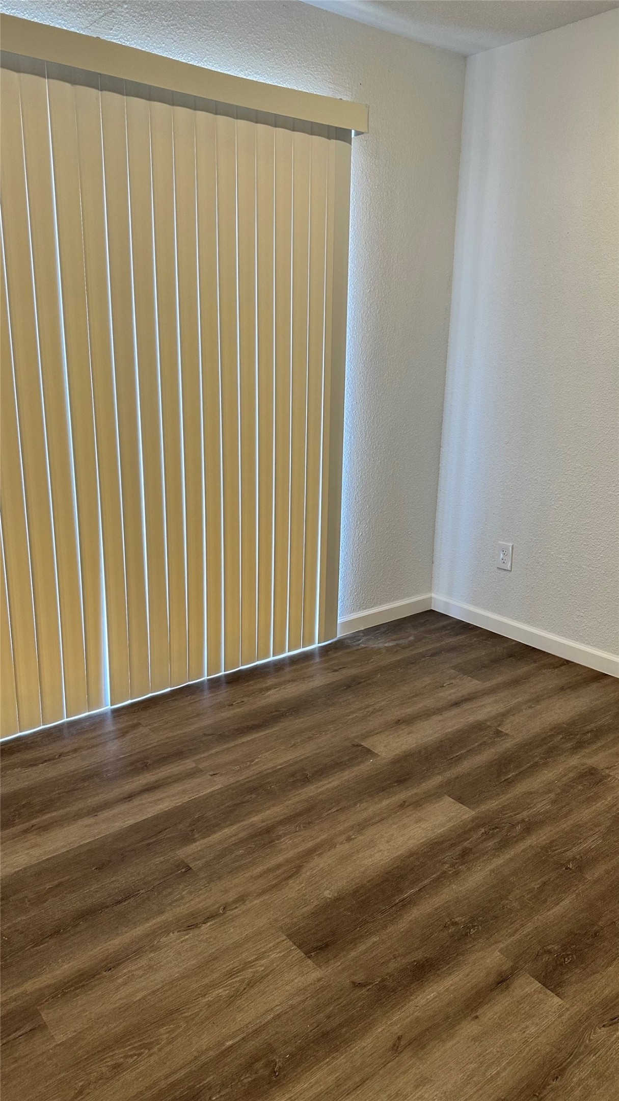 6200 Ranchester Drive, Unit 230 Houston, TX 77036 - Photo 17 of 31 a view of a room with wooden floor