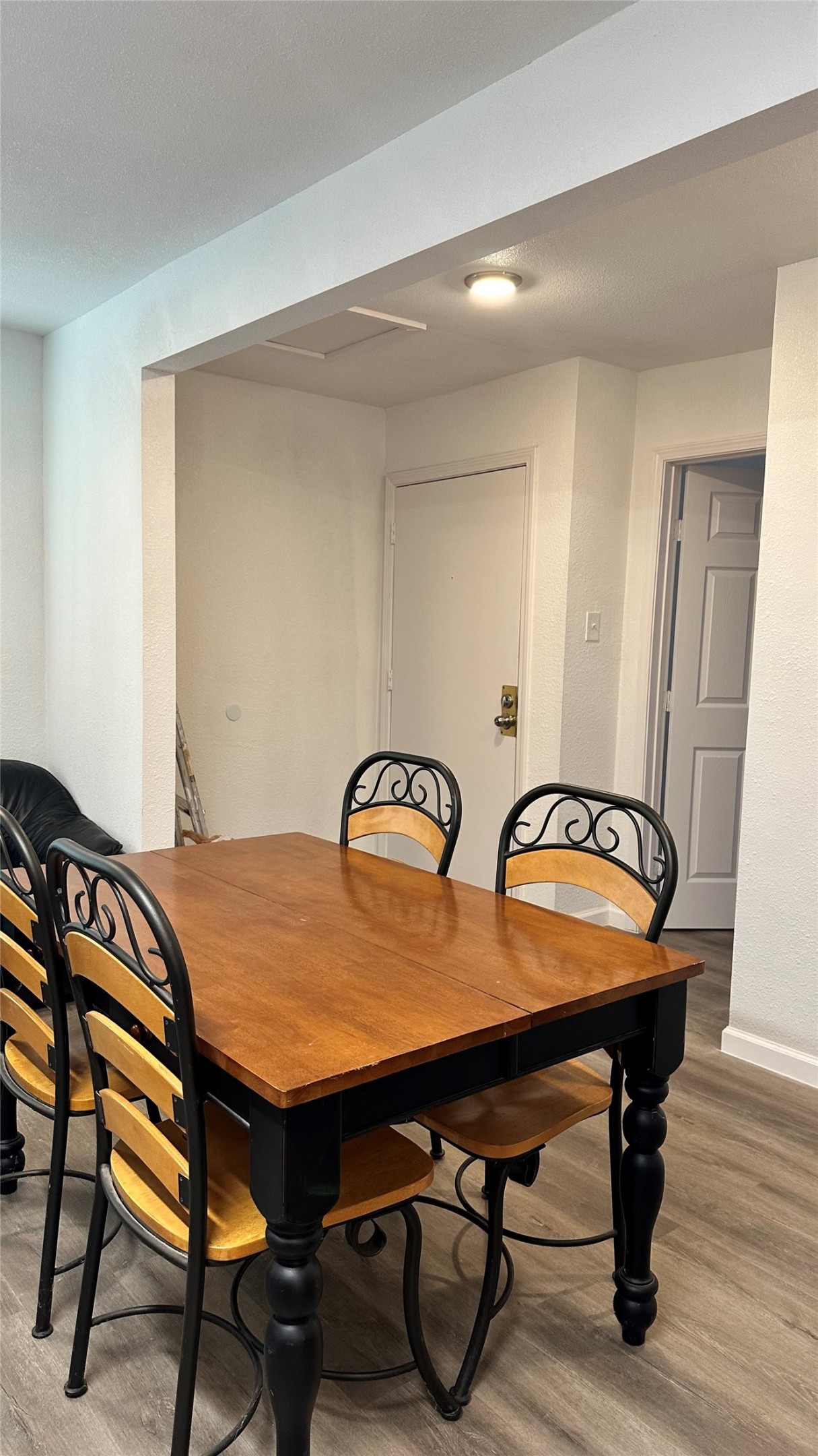 6200 Ranchester Drive, Unit 230 Houston, TX 77036 - Photo 7 of 31 a room with a table and chairs