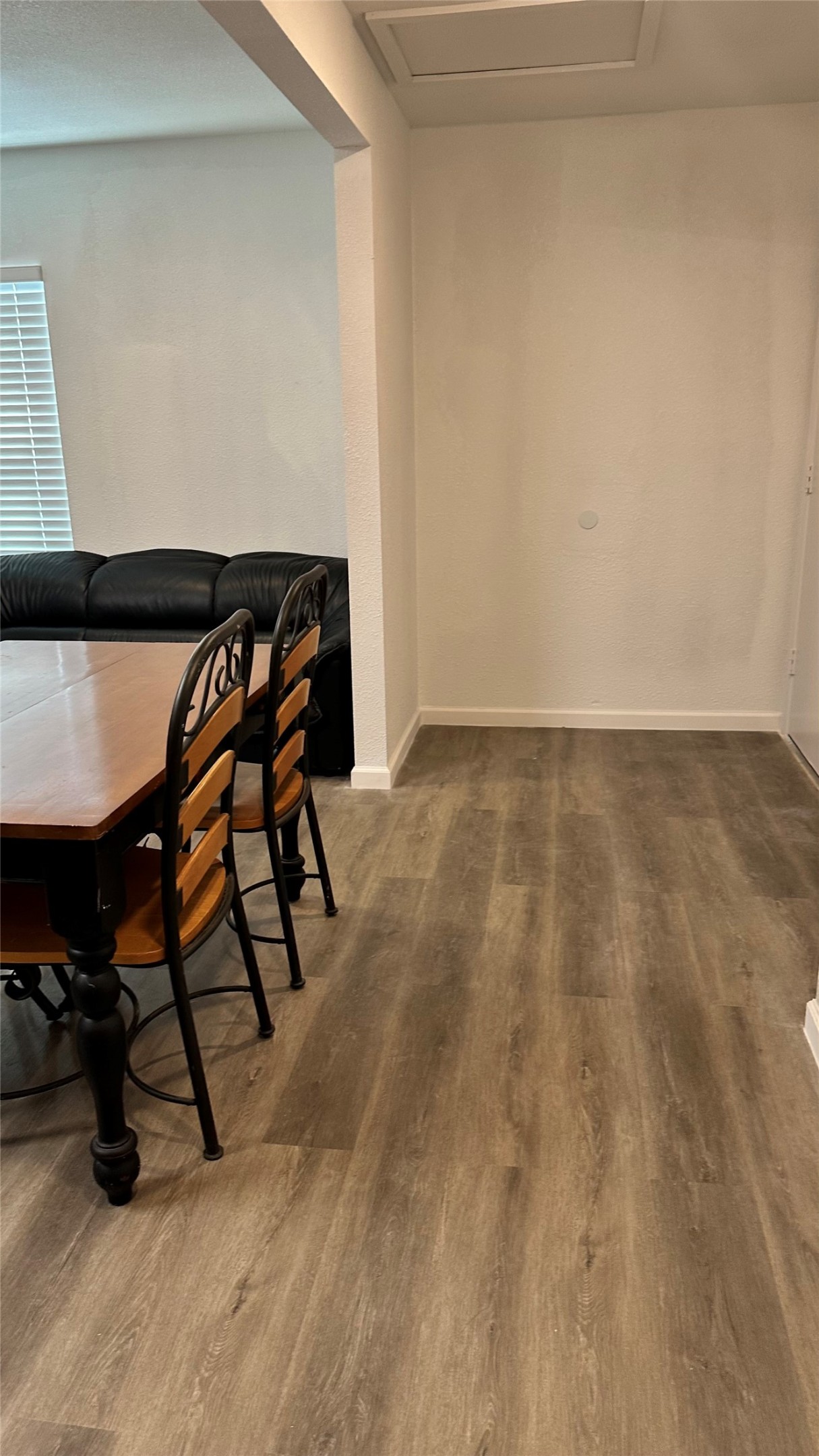 6200 Ranchester Drive, Unit 230 Houston, TX 77036 - Photo 8 of 31 a view of an empty room and wooden floor