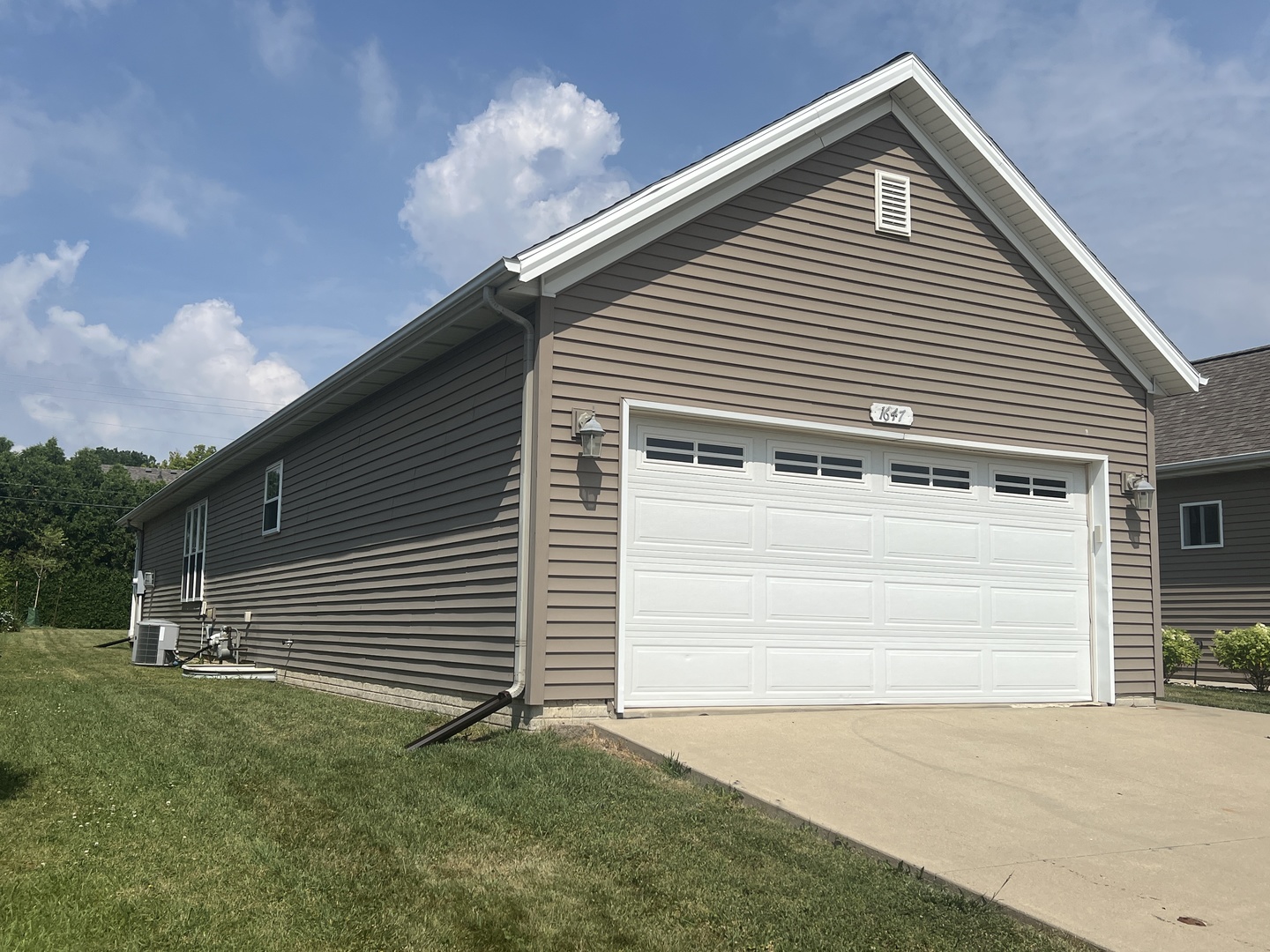 1647 Belclare Road Normal, IL 61761 - Photo 14 of 14 a front view of a house with a yard