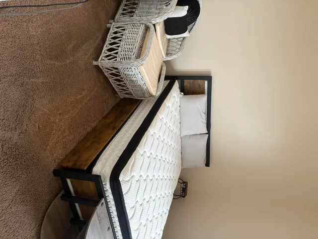 a view of staircase with wooden floor and windows