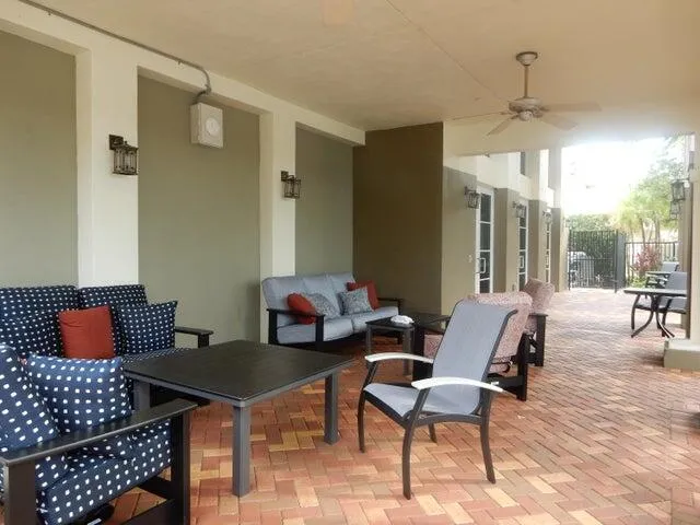 a view of a backyard with a patio