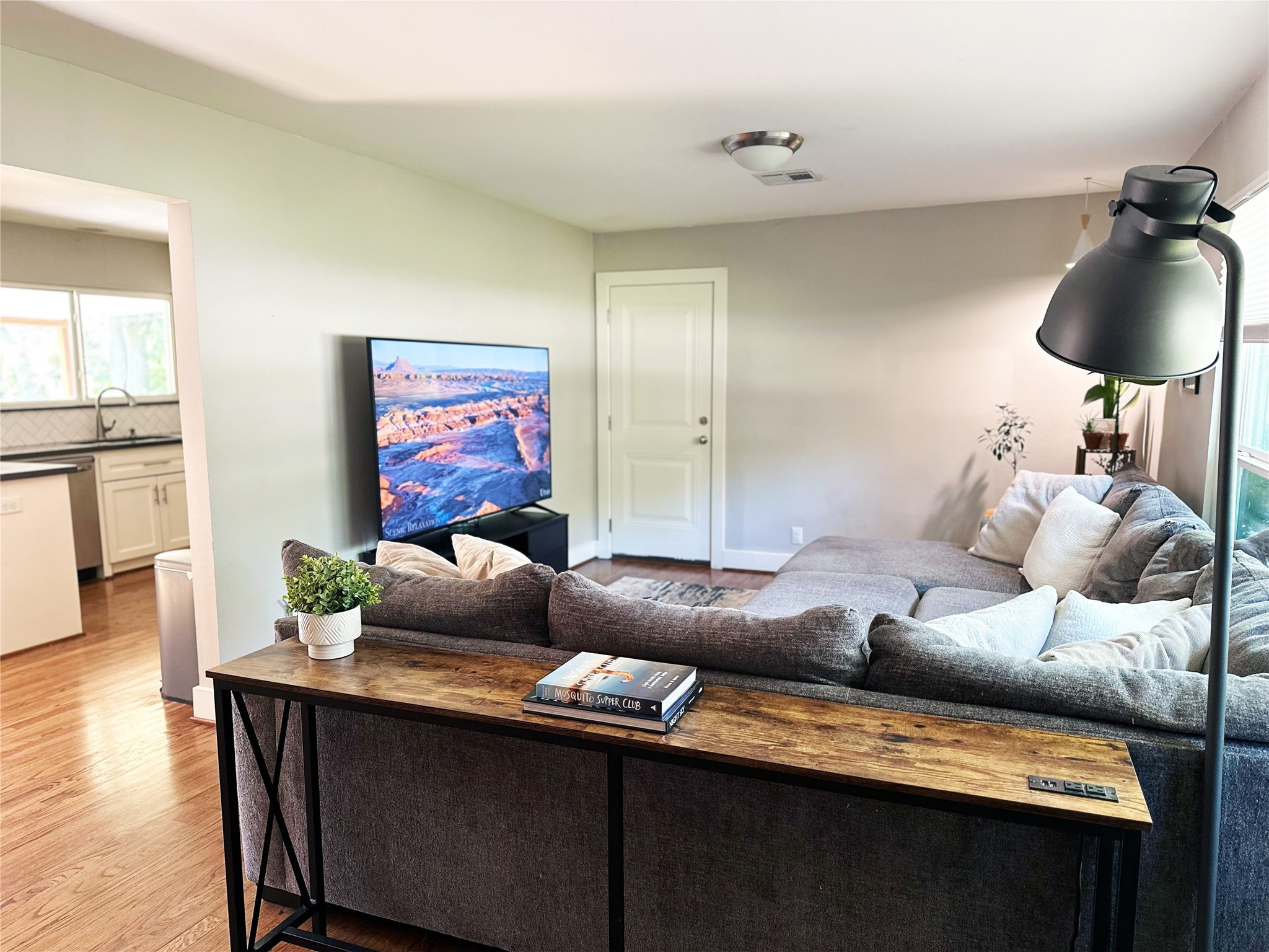 4821 Hummingbird Street Houston, TX 77035 - Photo 18 of 45 a living room with furniture and wooden floor