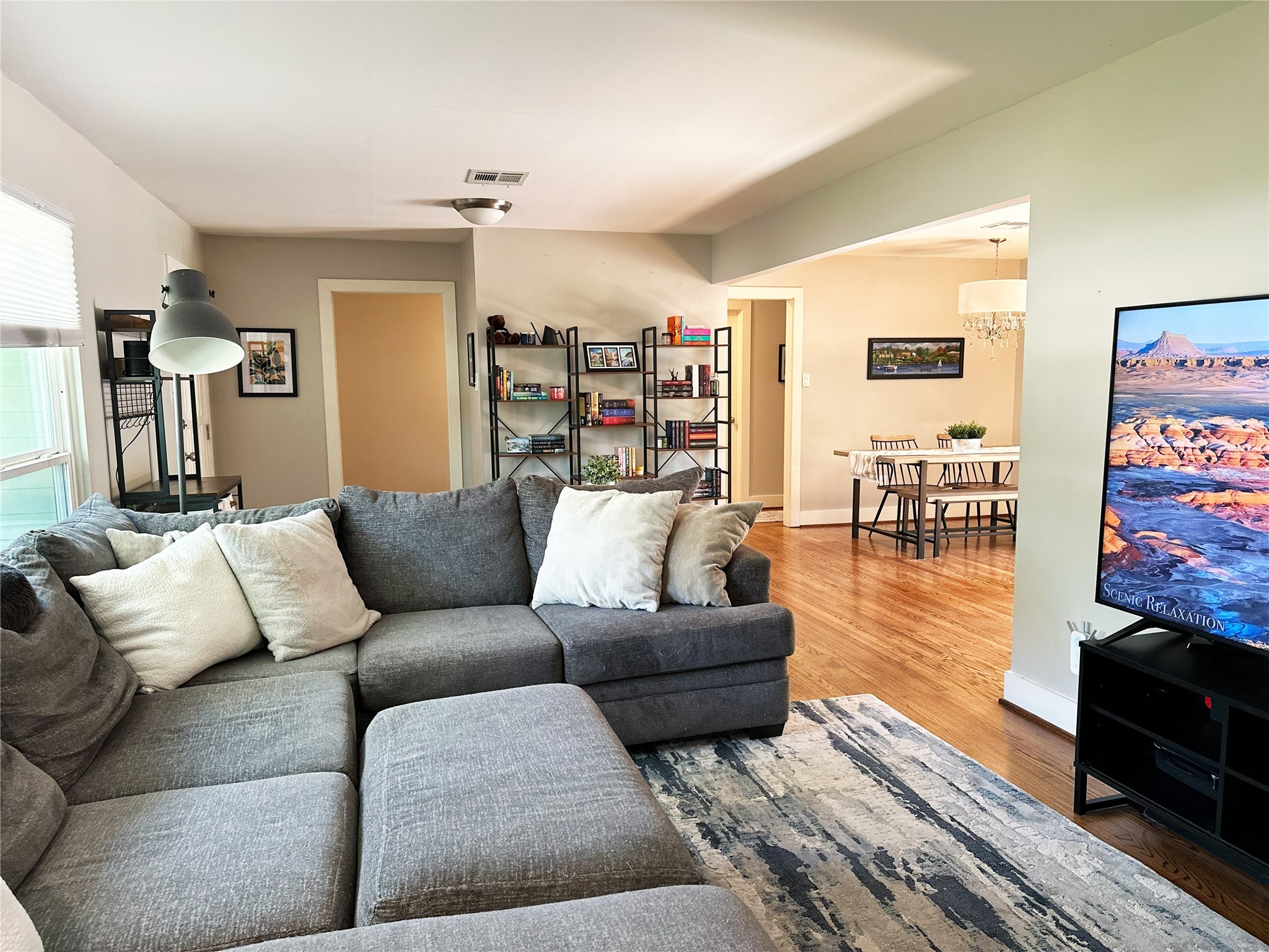4821 Hummingbird Street Houston, TX 77035 - Photo 19 of 45 a living room with furniture and a flat screen tv