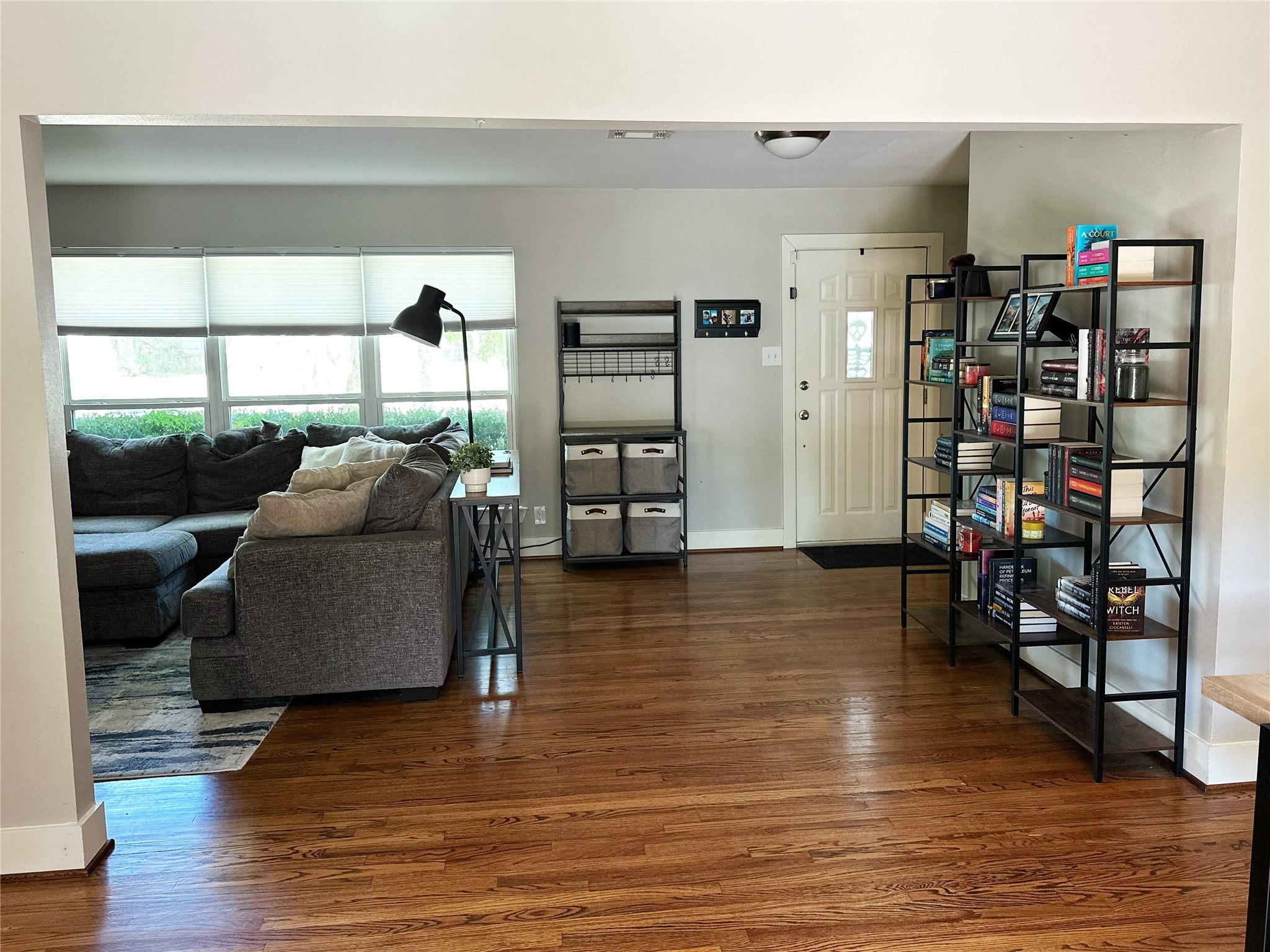 4821 Hummingbird Street Houston, TX 77035 - Photo 21 of 45 a living room with furniture and a wooden floor