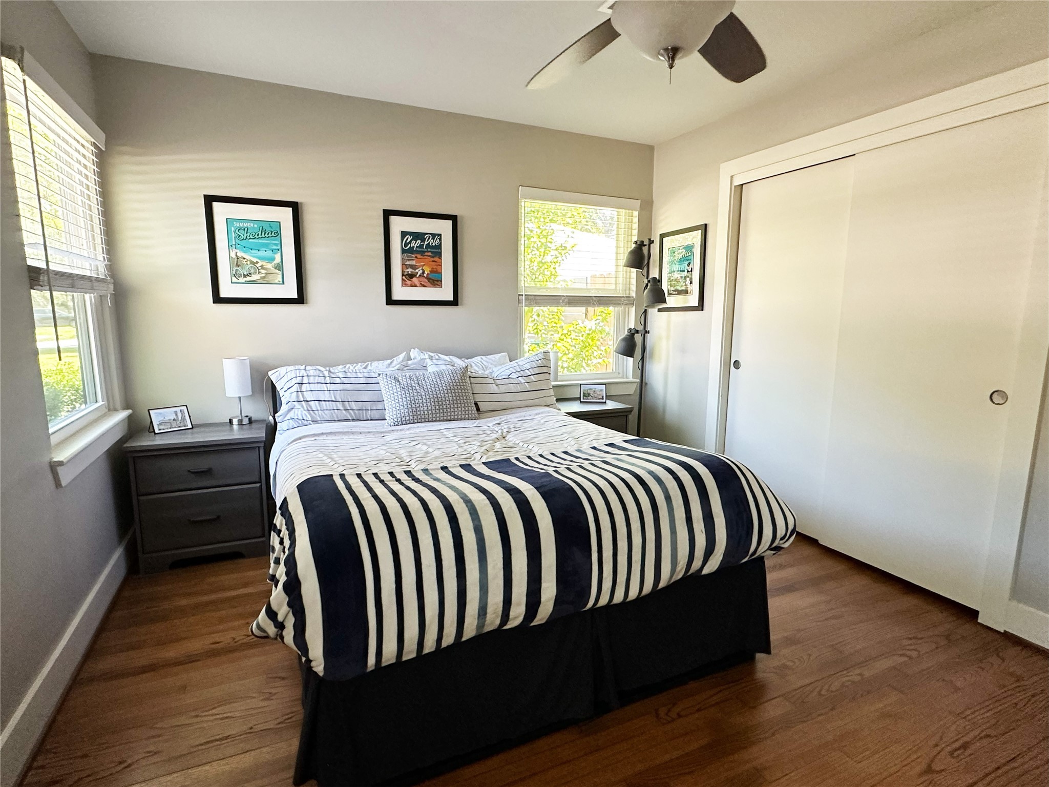 4821 Hummingbird Street Houston, TX 77035 - Photo 26 of 45 a bedroom with a bed and wooden floor