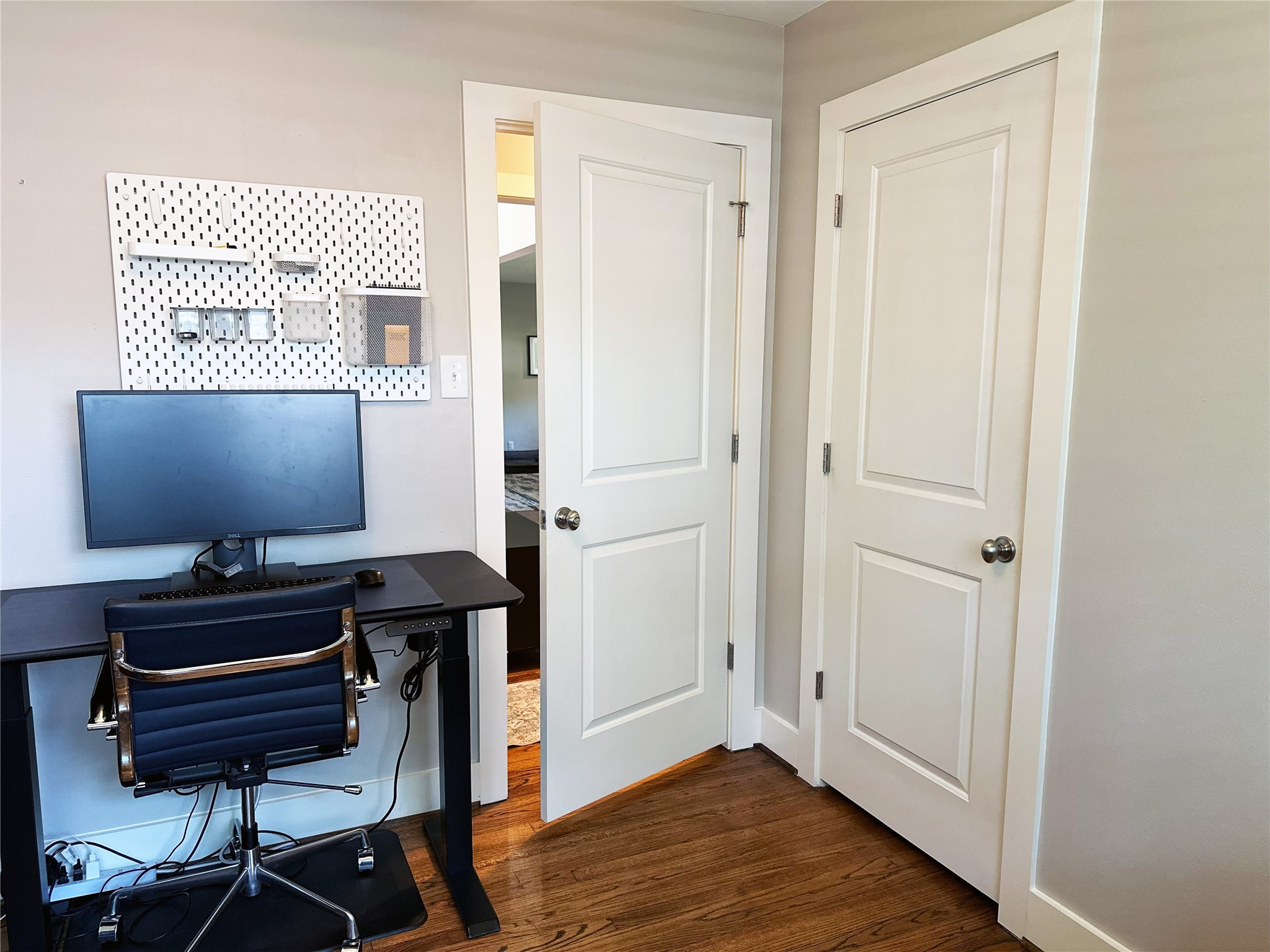 4821 Hummingbird Street Houston, TX 77035 - Photo 32 of 45 a view of a workspace with furniture and wooden floor