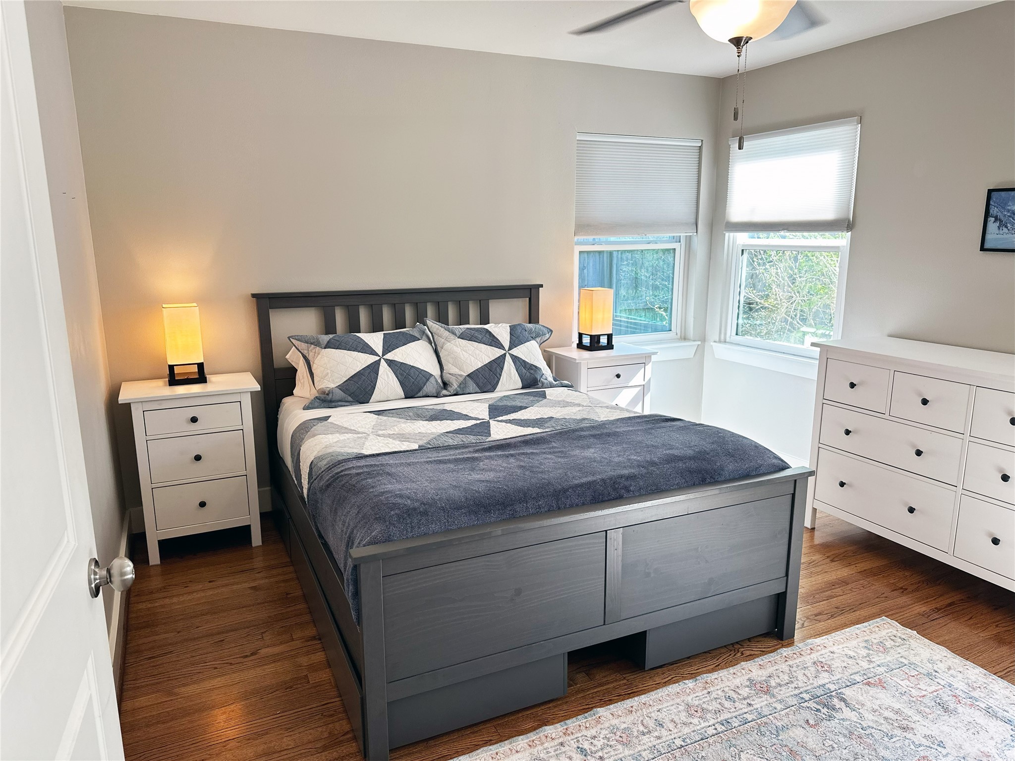 4821 Hummingbird Street Houston, TX 77035 - Photo 34 of 45 a large bed sitting in a bedroom next to a window with dresser