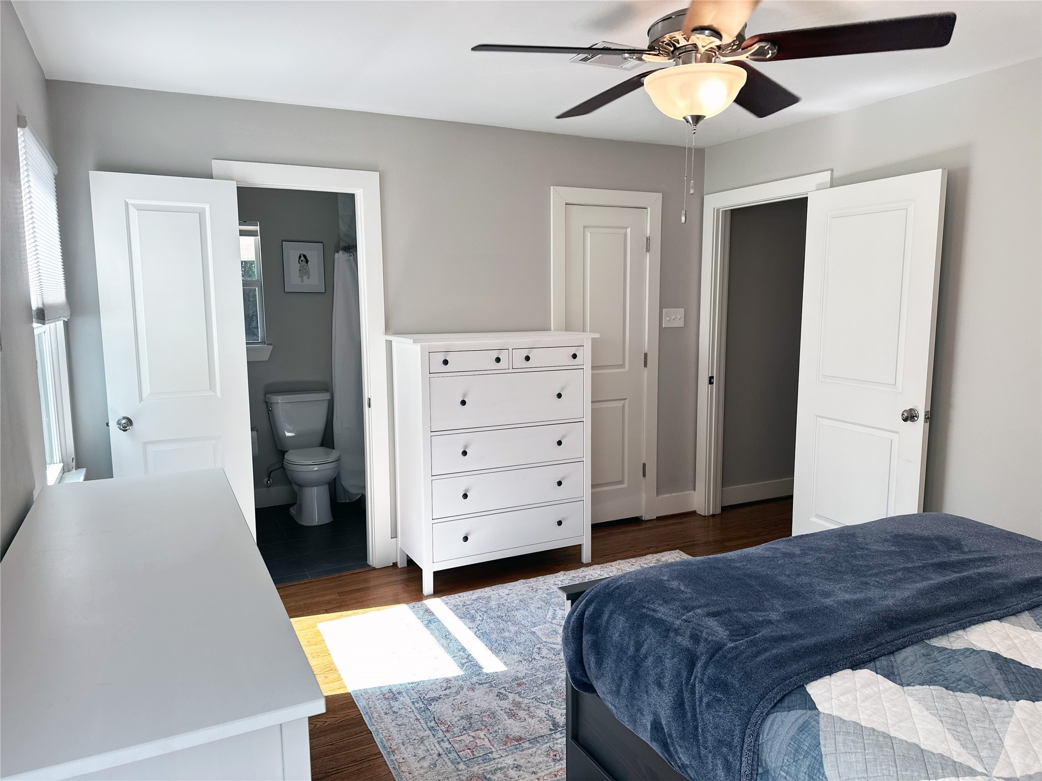 4821 Hummingbird Street Houston, TX 77035 - Photo 35 of 45 a bedroom with a bed and a dresser