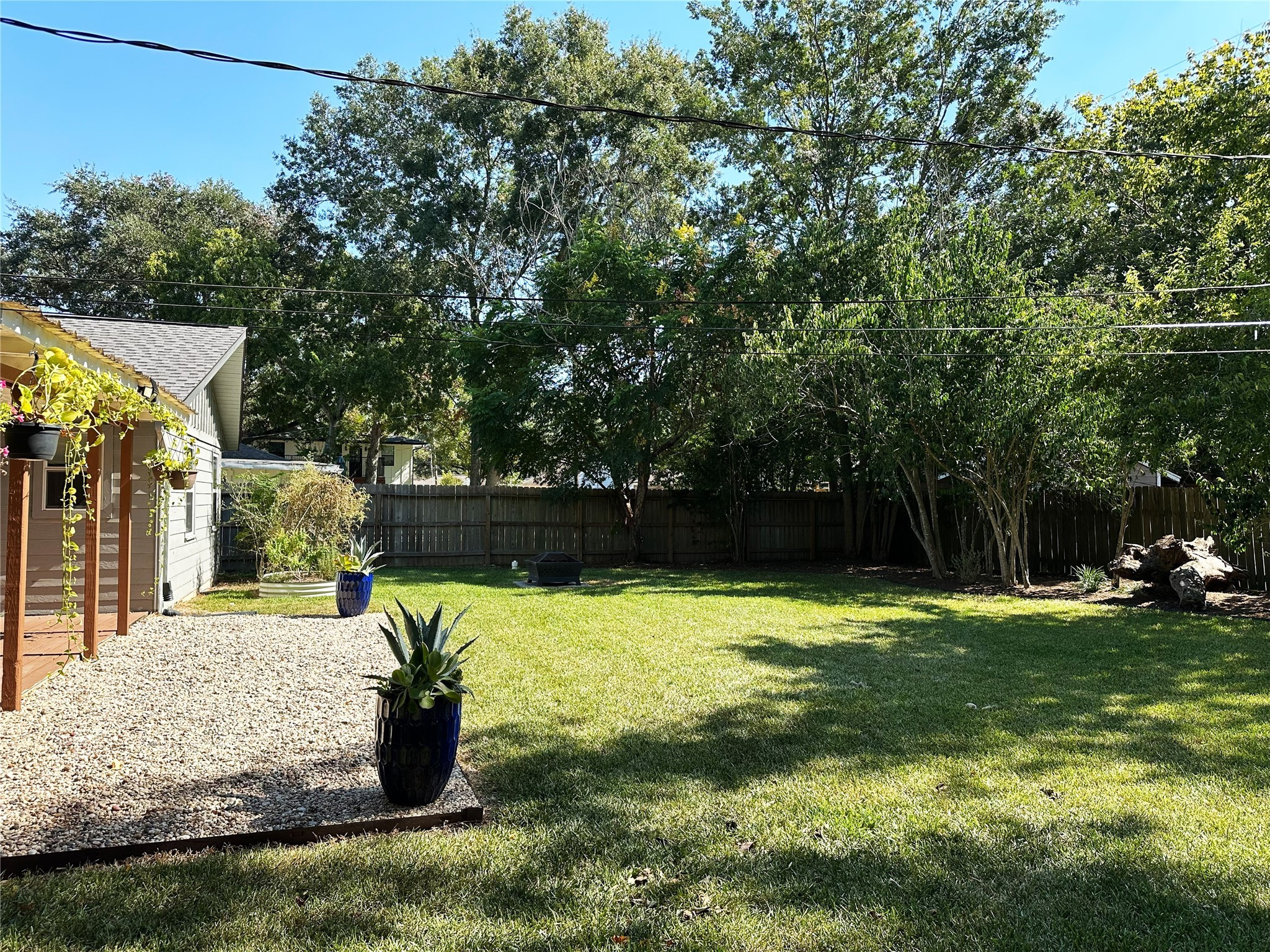 4821 Hummingbird Street Houston, TX 77035 - Photo 41 of 45 a swimming pool with trees in the background