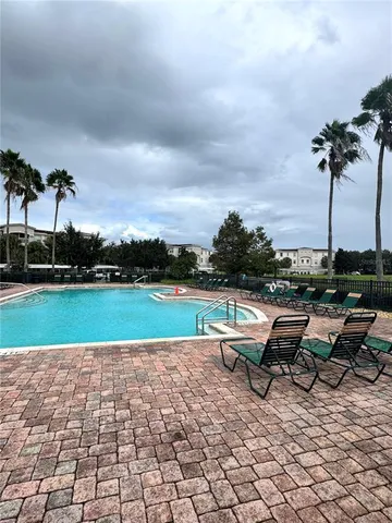 a view of a garden with sitting area