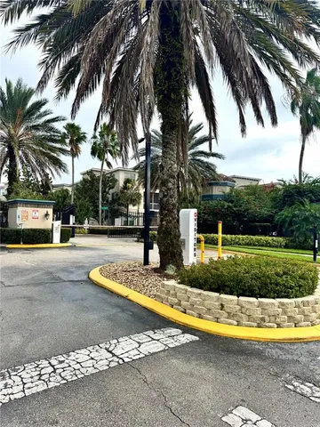 a view of yard with swimming pool and green space