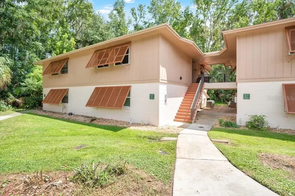 $197,500 | 150 Wax Myrtle Woods Court, Unit 9B, Deltona, FL 32725