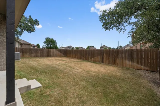 a view of an outdoor space and a yard