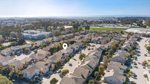an aerial view of a city with lots of residential buildings