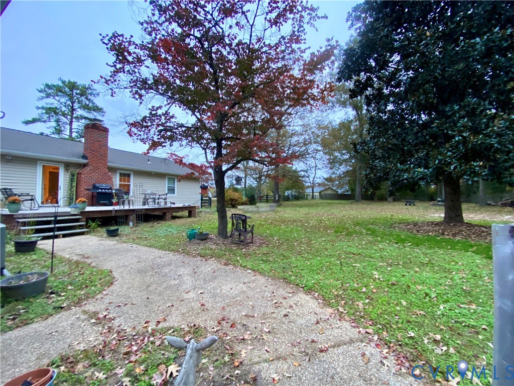 3766 Venter Road Aylett, VA 23009 - Photo 27 of 28 Spacious backyard featuring an expansive lawn, mat