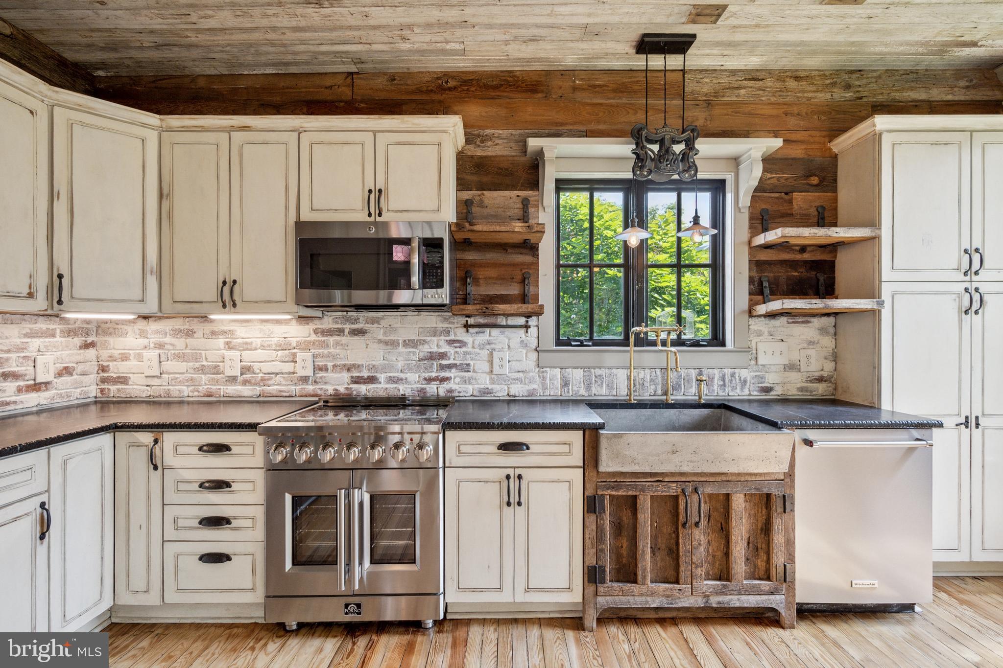 131 Ken Culbert Jr. Road Purcellville, VA 20132 - Photo 20 of 75 Newer appliances and French-door Forno oven