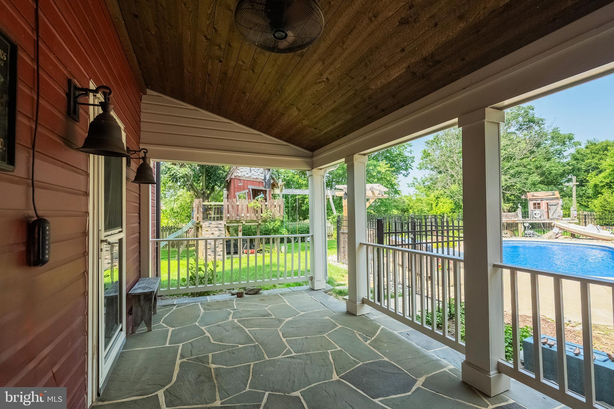 131 Ken Culbert Jr. Road Purcellville, VA 20132 - Photo 64 of 75 Pool patio off family room and main level bathroom