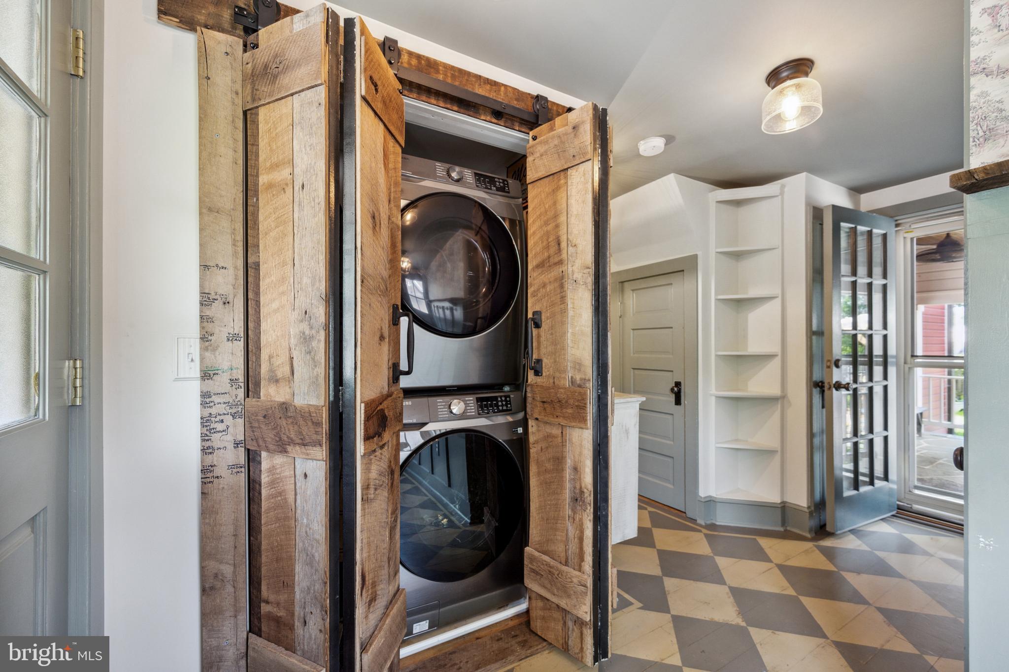 131 Ken Culbert Jr. Road Purcellville, VA 20132 - Photo 7 of 75 Rustic barn doors conceal laundry