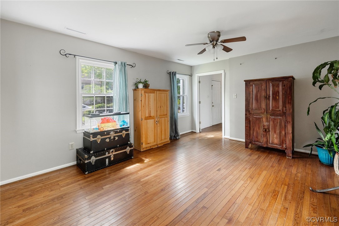 1908 Early Settlers Road Richmond, VA 23235 - Photo 12 of 25 a view of a room with wooden floor ceiling fan