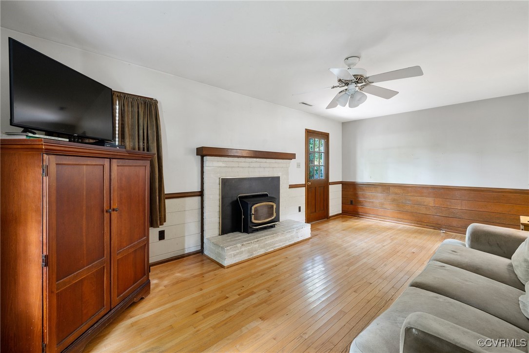 1908 Early Settlers Road Richmond, VA 23235 - Photo 3 of 25 a living room with furniture and a fireplace